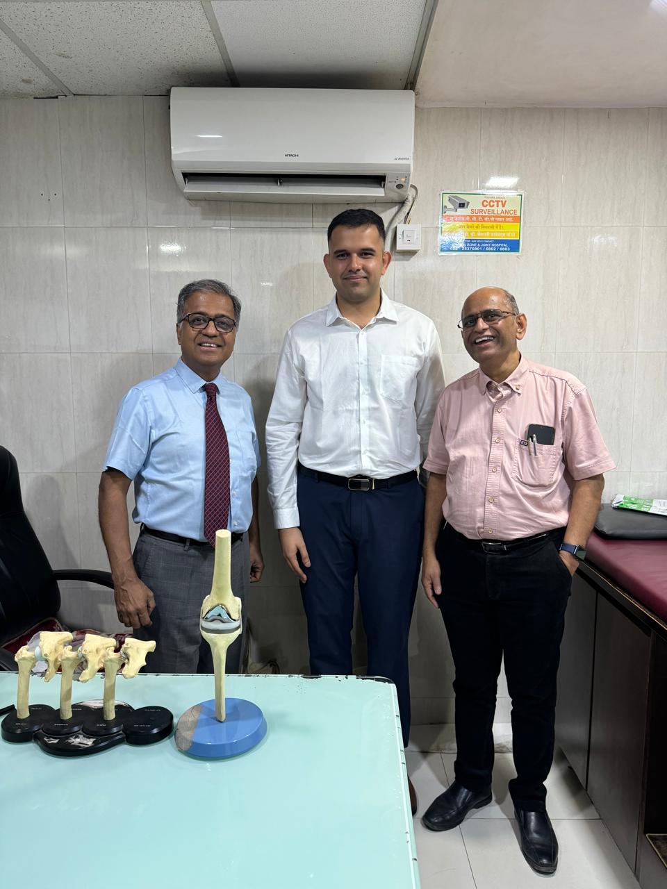 Dr. Milind Patil presenting the Fellowship certificate to Dr. Rushikesh Abhyankar at Revival Bone and Joint Hospital, Thane